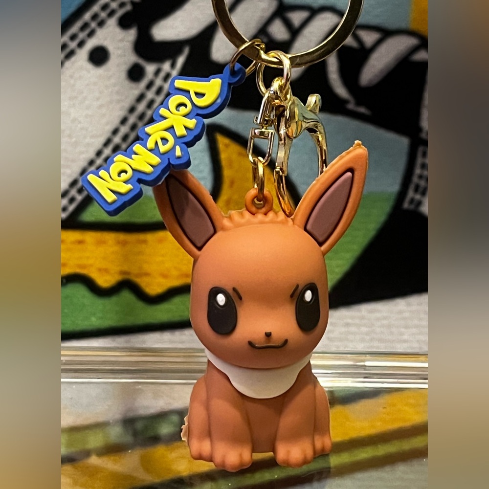 Pokemon Assorted Keychains with figurines and matching colored band.
